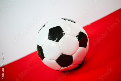 Football on red white background