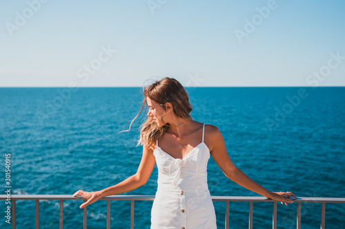 woman relaxing in front of the ocean