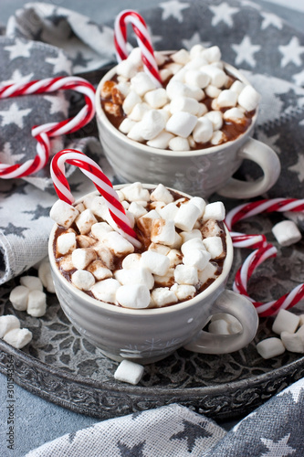 Christmas mugs with hot chocolate and marshmallows. Holiday concept