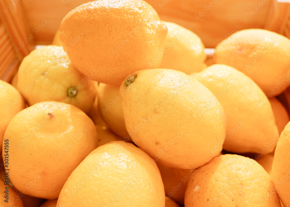 Fresh organic lemon in wooden box