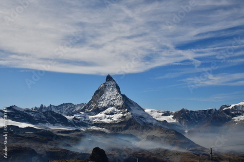 the great matterhorn touching the clouds