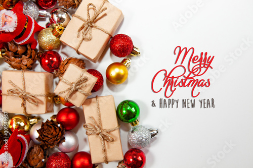 Merry Christmas and happy holidays xmas gifts. Baubles, presents, candy with christmas ornaments. Top view. Christmas family traditions on white background