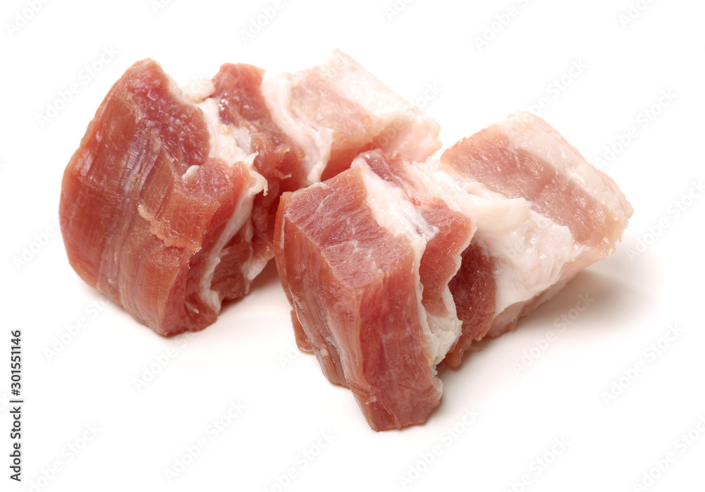 Raw pork belly pieces on a white background Raw pork belly pieces on a white background