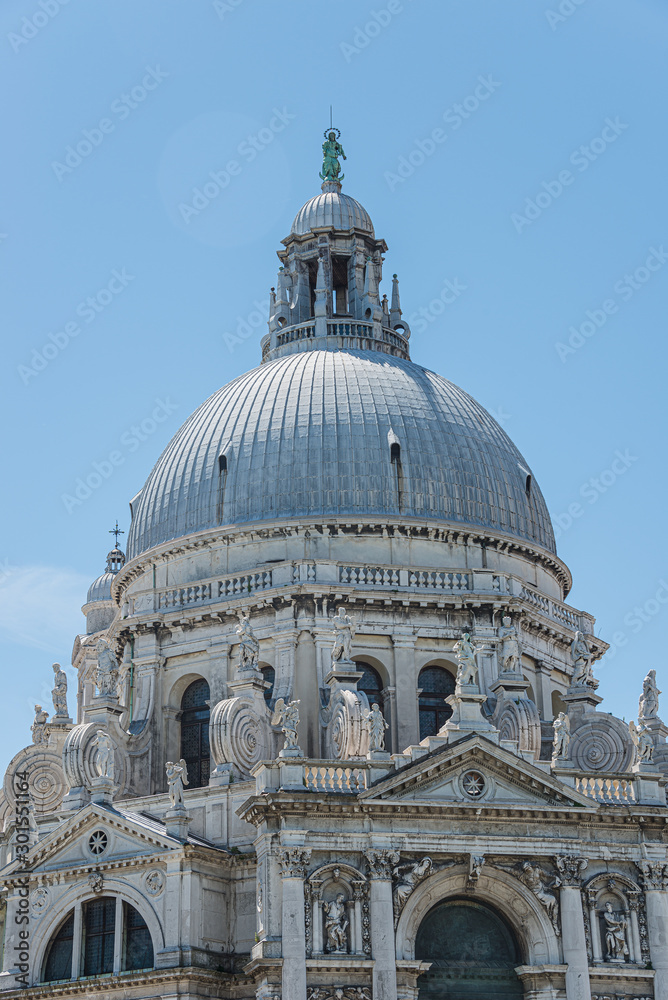 Basilica di Santa Maria della Salute at Grand Canal at blue sky, Venice, Italy, summer time, details