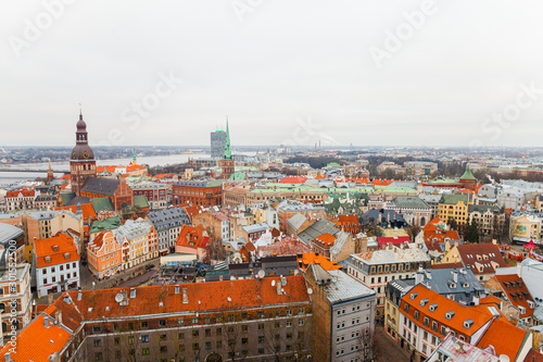 Panorama view from Riga cathedral on old town of Riga, Latvia. Beautiful aerial view of the Riga city centre. View of the roofs of the old town from above. Winter season in Riga, Latvia.