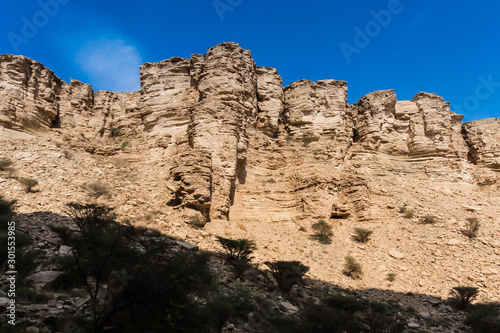 A rock cliff in the Sha'ib Luha valley south of Riyadh, Saudi Arabia photo