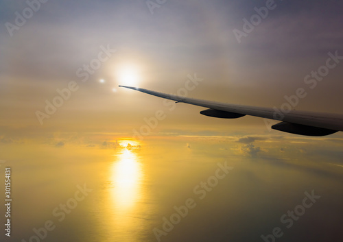 airplane wing sunrise