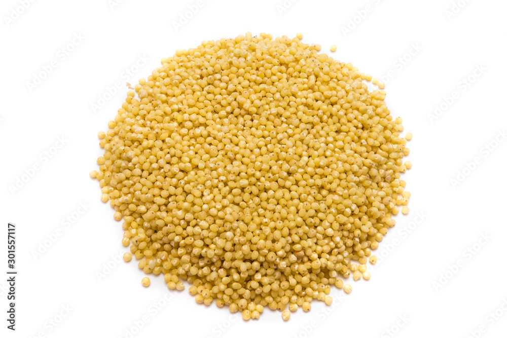 Heap of millet grains isolated on white background Heap of millet grains isolated on white background