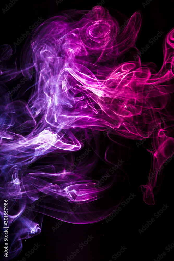 Colored smoke on black background Colored smoke on black background