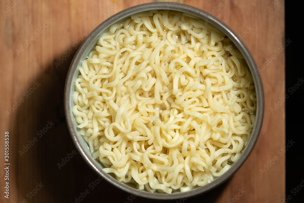 cup with instant noodles. white noodles cup with instant noodles. white noodles