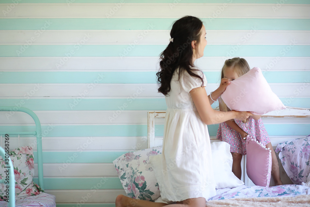 Morning idleness. Mom and daughter have fun. Morning idleness. Mom and daughter have fun.