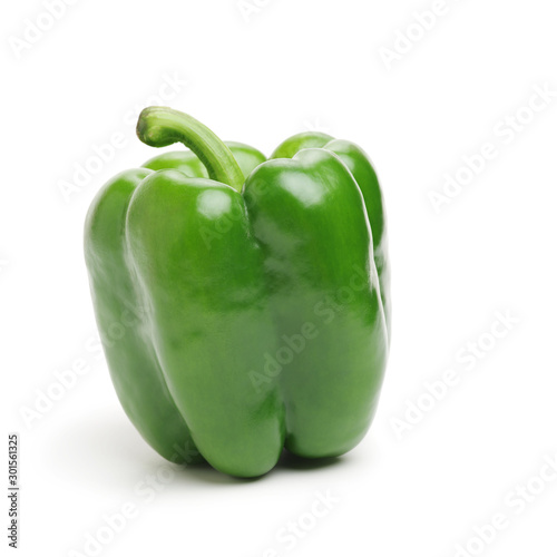 fresh green bell pepper (capsicum) on a white background