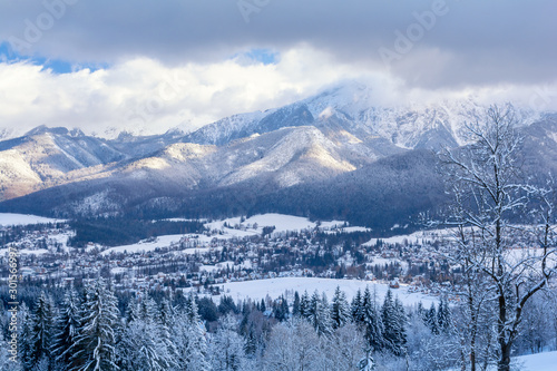 view on popular polish ski resort in Tatra Mountains - Zakopane during winter, Poland © lukaszimilena