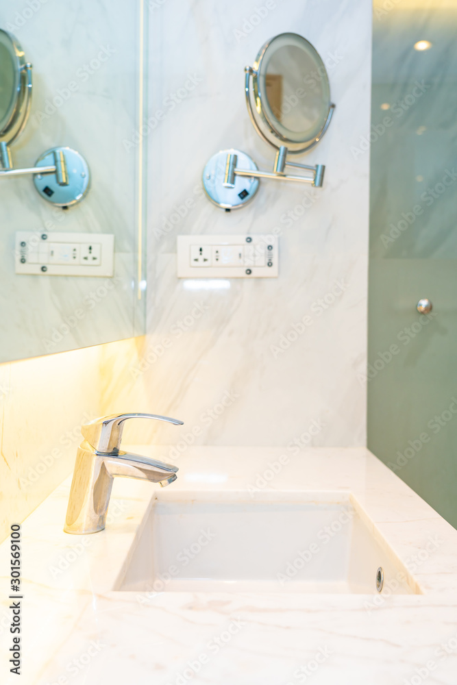 Faucet water and sink decoration in bathroom interior Faucet water and sink decoration in bathroom interior