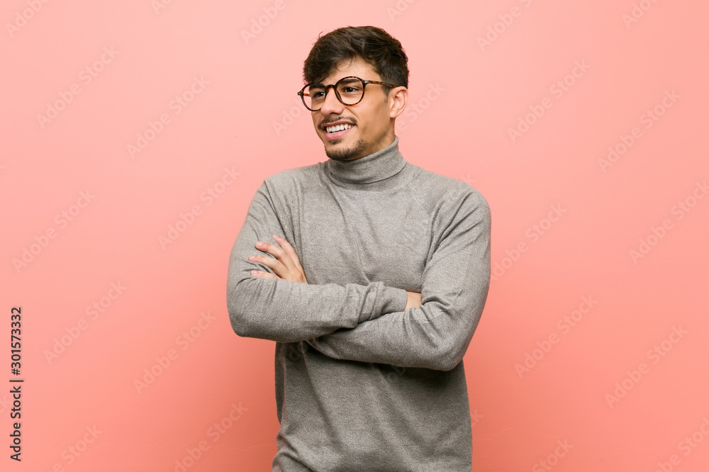Young smart student man smiling confident with crossed arms. Young smart student man smiling confident with crossed arms.