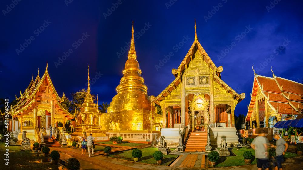 Wat Phra Singh temple at twilight time at Chiang Mai in Thailand.