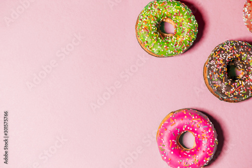 Group of glazed donuts on background