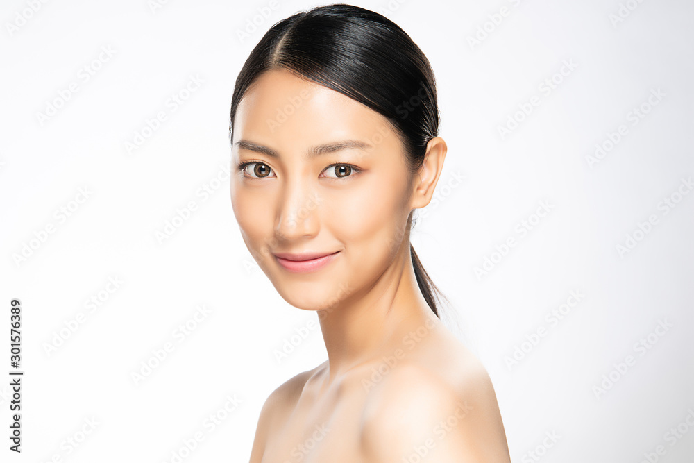 Beautiful Young Asian Woman smile feeling so happy and cheerful. with healthy Clean and Fresh skin. isolated on white background. Beauty Cosmetics Concept Beautiful Young Asian Woman smile feeling so happy and cheerful. with healthy Clean and Fresh skin. isolated on white background. Beauty Cosmetics Concept