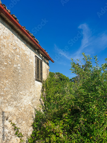 old mediterranean house and blue sky