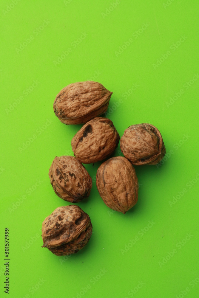 Garlic walnuts in color background Garlic walnuts in color background