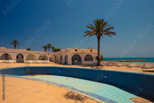Landscape of a destroyed and abandoned resort in Djerba, Tunisia caused by independence.