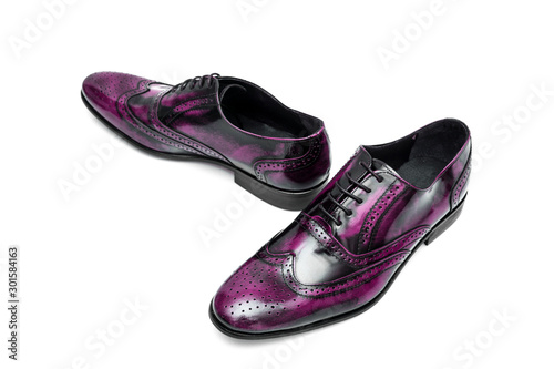 Pair of male purple leather shoes on white background, isolated product, top view.