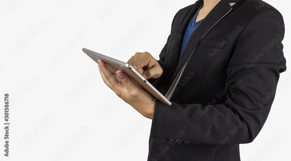 A man ware black suite using tablet ,isolated A man ware black suite using tablet ,isolated