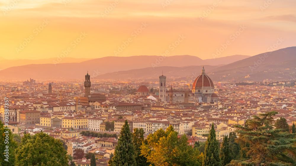 Breathtaking view of sunset over the city of Florence. Travel destination Tuscany, Italy