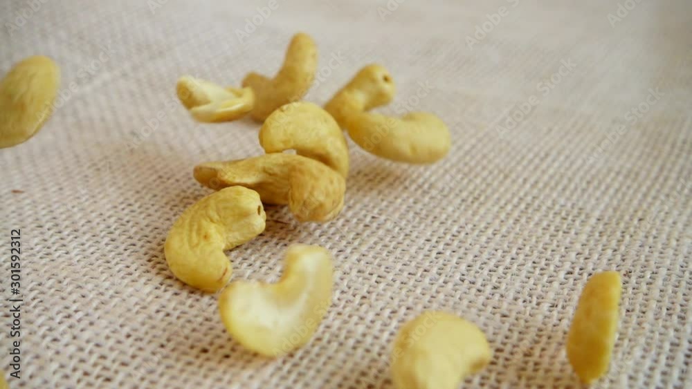 Cashews nuts. Shooting while falling on a sack. Slow motion. Cashews nuts. Shooting while falling on a sack. Slow motion.