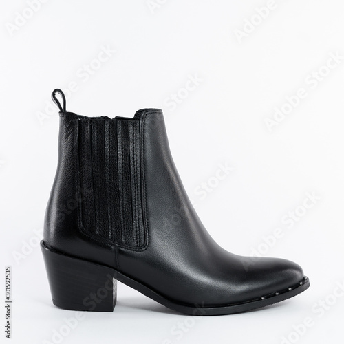 Women's autumn ankle boots black zip average heels, one pair of isolated white background