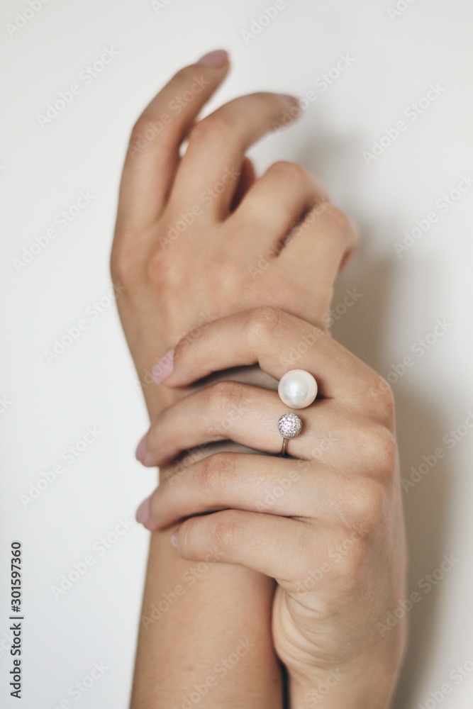 Tender jewerly on female hand, close up shot