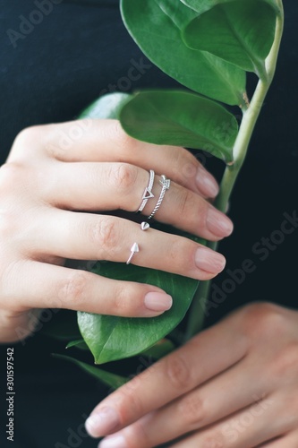 Obraz na płótnie Tender jewerly on female hand, close up shot w salonie