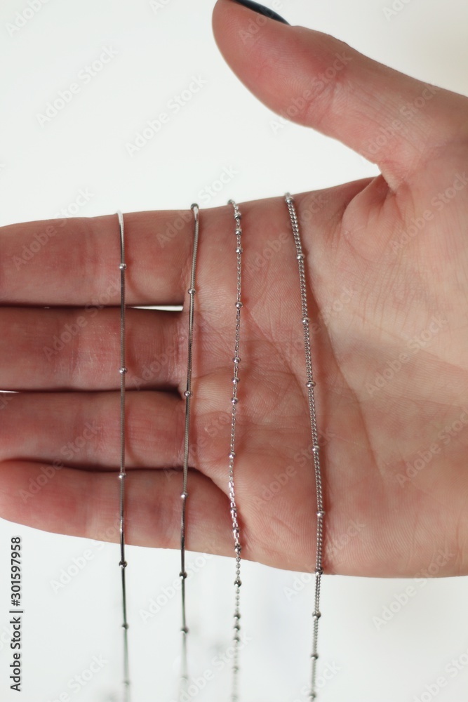 Tender jewerly on female hand, close up shot