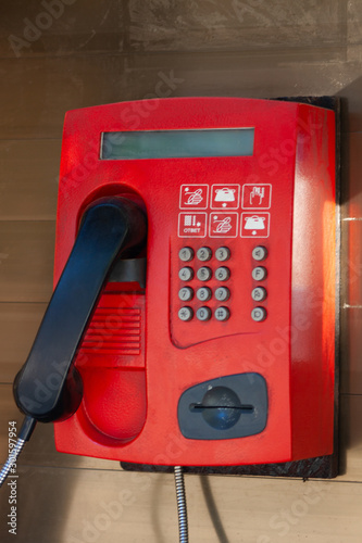 Red payphone. Red street phone.