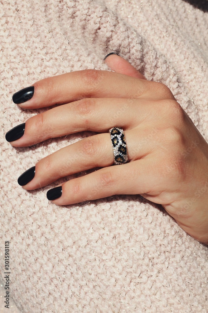 Tender jewerly on female hand, close up shot