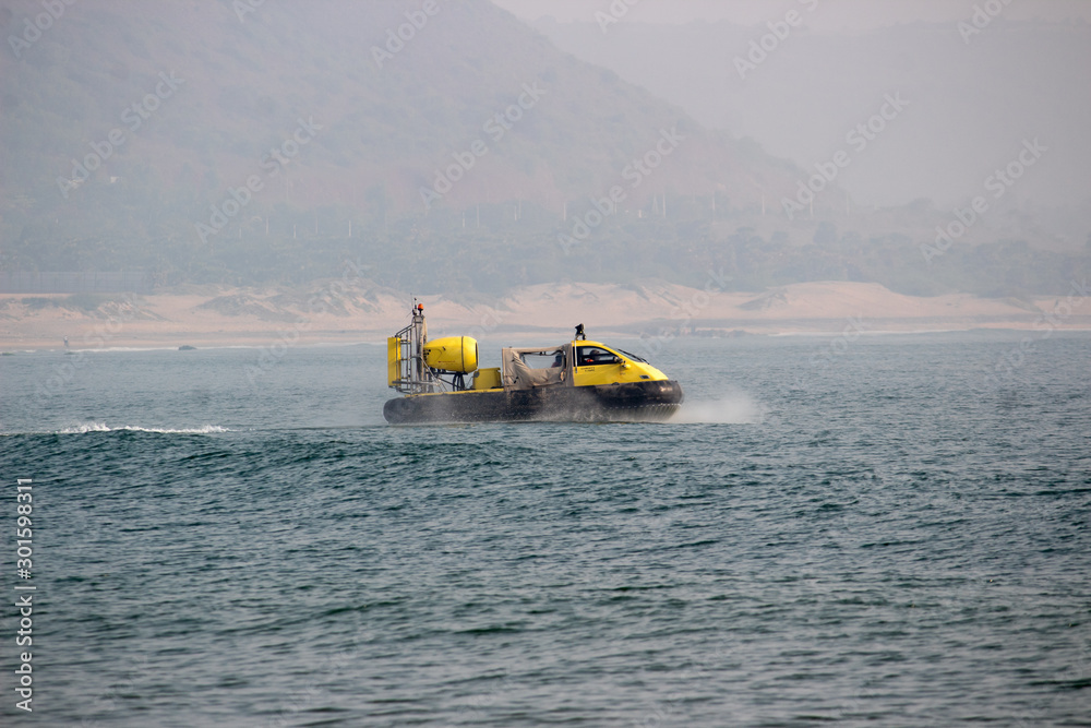 Fototapeta premium Hovercraft moving in Rushikonda beach, Visakhapatnam, India