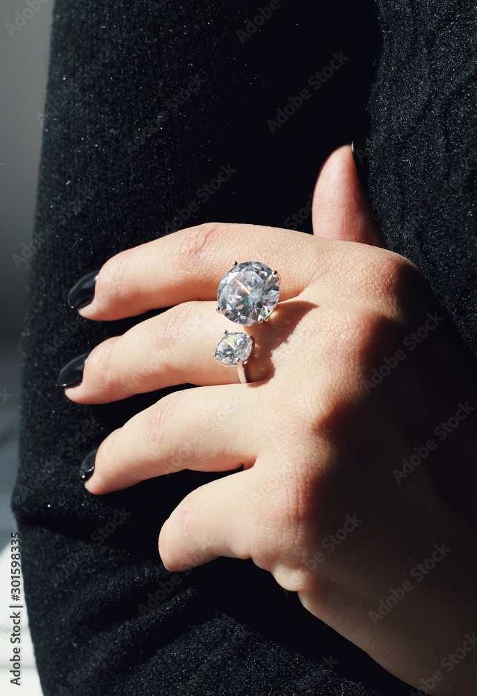 Tender jewerly on female hand, close up shot