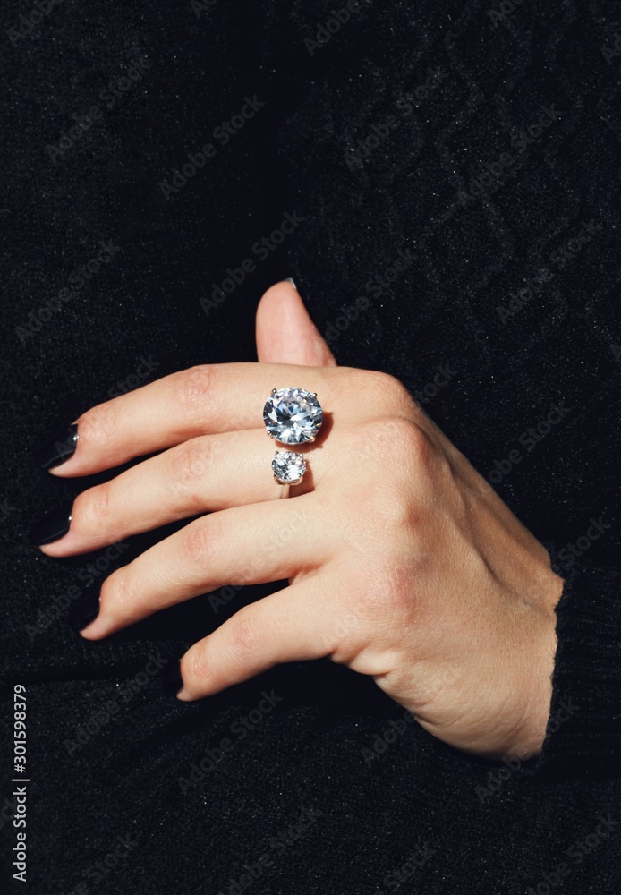 Tender jewerly on female hand, close up shot