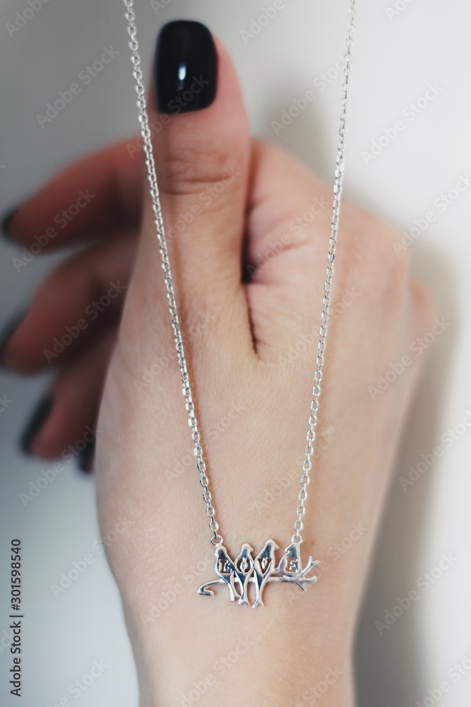Tender jewerly for female neck, close up shot
