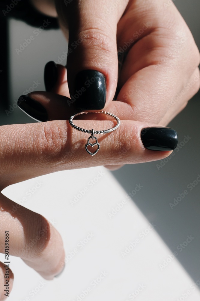 Tender jewerly on female hand, close up shot