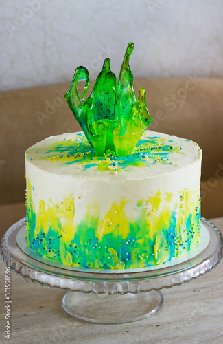 bright holiday cake with caramel decoration on the table