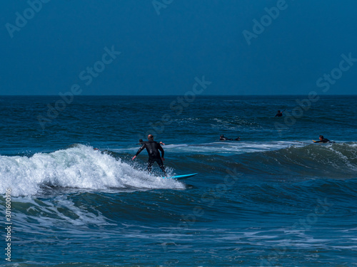 California Surfer and his turquoise Board enjoy the sea © Wolfgang Hauke