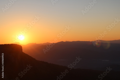 beautiful sunrise in the mountains in orange shades © chichur