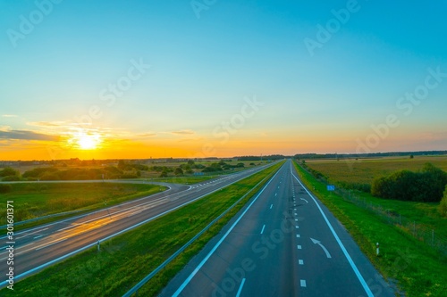 Empty motorway at sunset