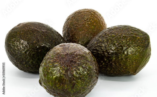 Group of avocados in composition