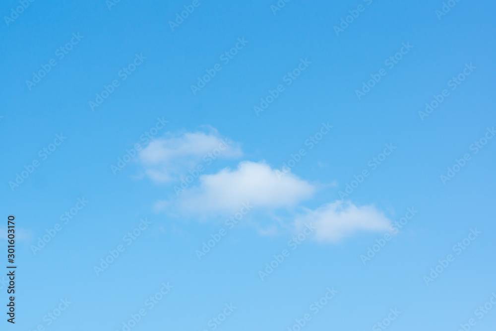 blue sky with light white clouds