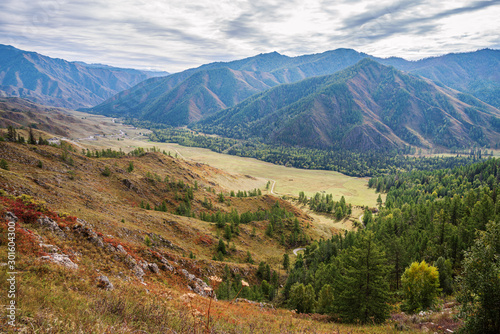 Serpentine mountain road. View of the Chuysky tract from the Chike-Taman pass, Altai mountains, Russia