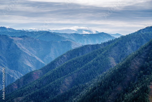 Mountain landscape with snowy peaks. View from the Chike-Taman pass, mountain Altai, Russia