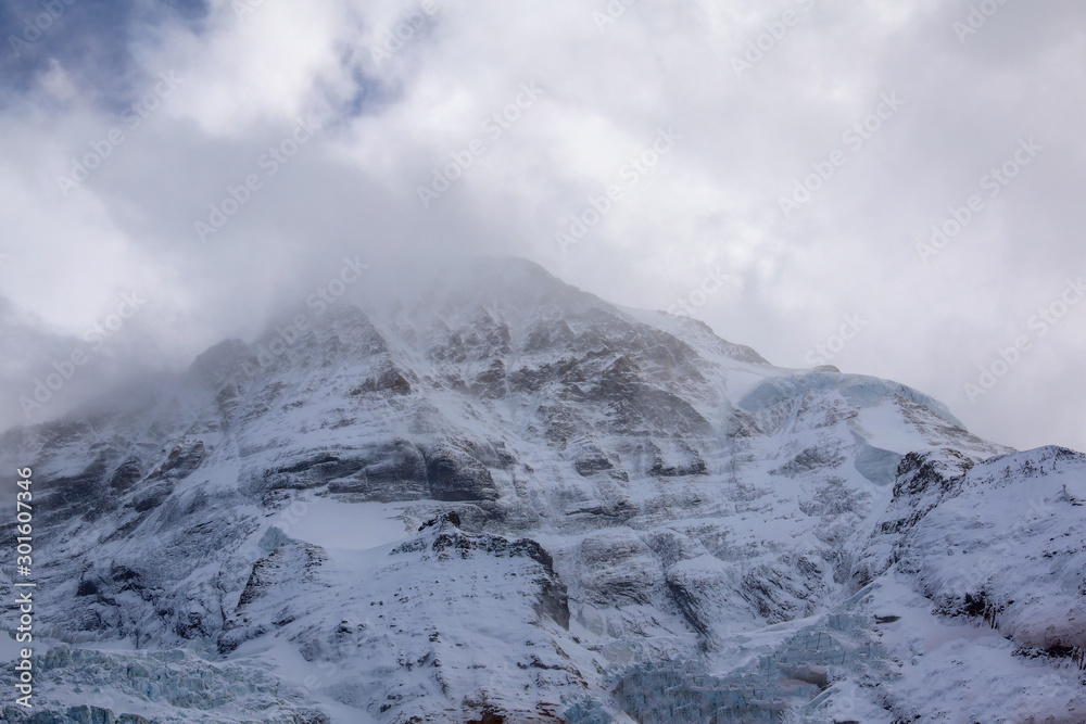 Obraz premium View of snow alp mountain landscape in autumn nature at swiss