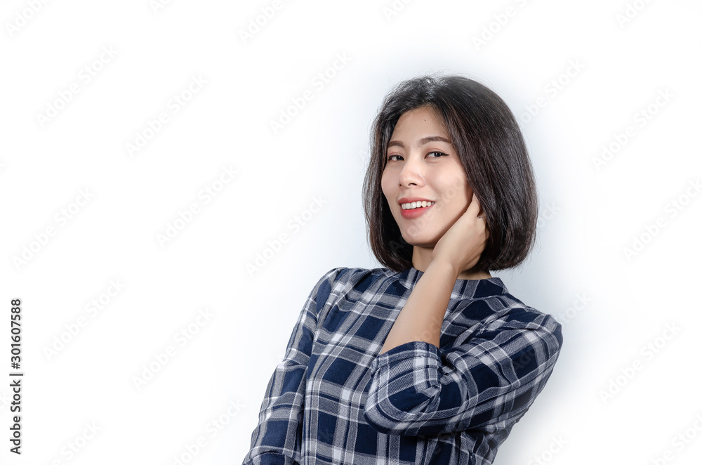 Beautiful smiling woman with clean skin, natural make-up, and white teeth on grey background Beautiful smiling woman with clean skin, natural make-up, and white teeth on grey background